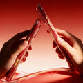 TORRAS Year of the Horse Q&O3 Air Stand iPhone 17 case, transparent red, gold buttons.