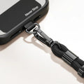 TORRAS LoopGo Flex black phone lanyard, zinc alloy clasp, braided rope, 'Never Stop' case