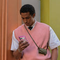 TORRAS Ostand Q3 Air case for iPhone 17 Pro Max, pink colorblock design with magnetic stand.