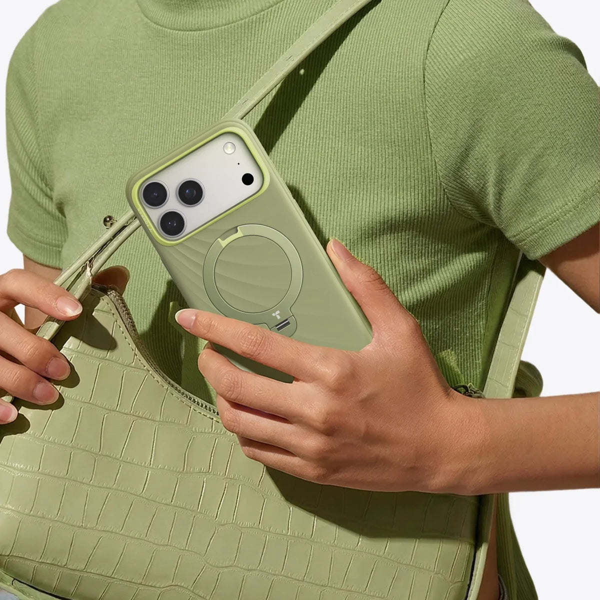 TORRAS Ostand Q3 green silicone case for iPhone 17 Pro with magnetic stand