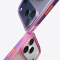 TORRAS Ostand Q3 Air iPhone 17 Pro Max colorblock case, translucent purple/pink with orange button.