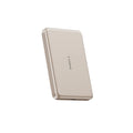 Slim gold TORRAS MiniMag 10k mAh magnetic power bank with LED charge indicators.