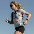 TORRAS Ostand O3 Air clear case with magnetic stand for iPhone 17 Series, held by runner.