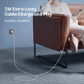TORRAS Iceflow 2M extra-long charging cable for charging and using phone.