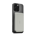 TORRAS minimalist leather slim wallet in light grey, attached to a smartphone.