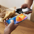 GlassGo screen protector on Samsung S26 Series phone for contactless payment.