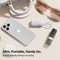 TORRAS PocketVolt 5000mAh mini power bank with built-in USB-C, styled with iPhone.