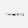 White TORRAS Ostand O3 Fitness iPhone case bottom: USB-C port, speaker grilles, textured grip