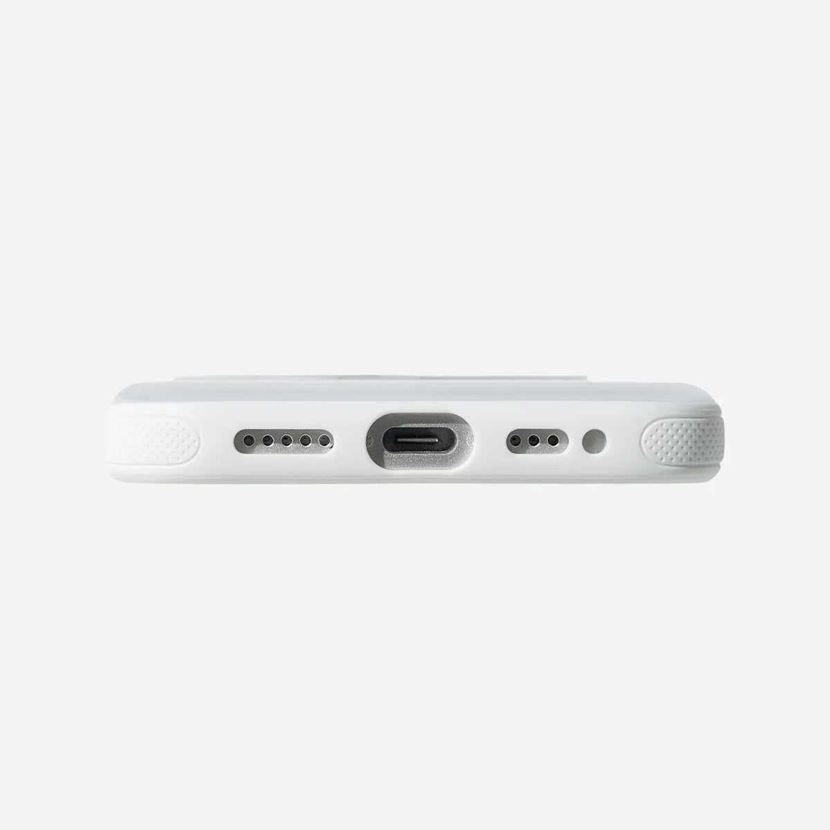 White TORRAS Ostand O3 Fitness iPhone case bottom: USB-C port, speaker grilles, textured grip