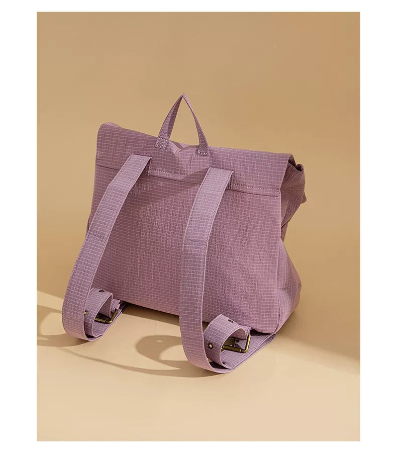 Back view and adjustable straps of the Purple COROBALL backpack