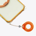 TORRAS Ostand O3 Air Bios iPhone 17 Pro case, clear with orange frame, magnetic stand, and lanyard.