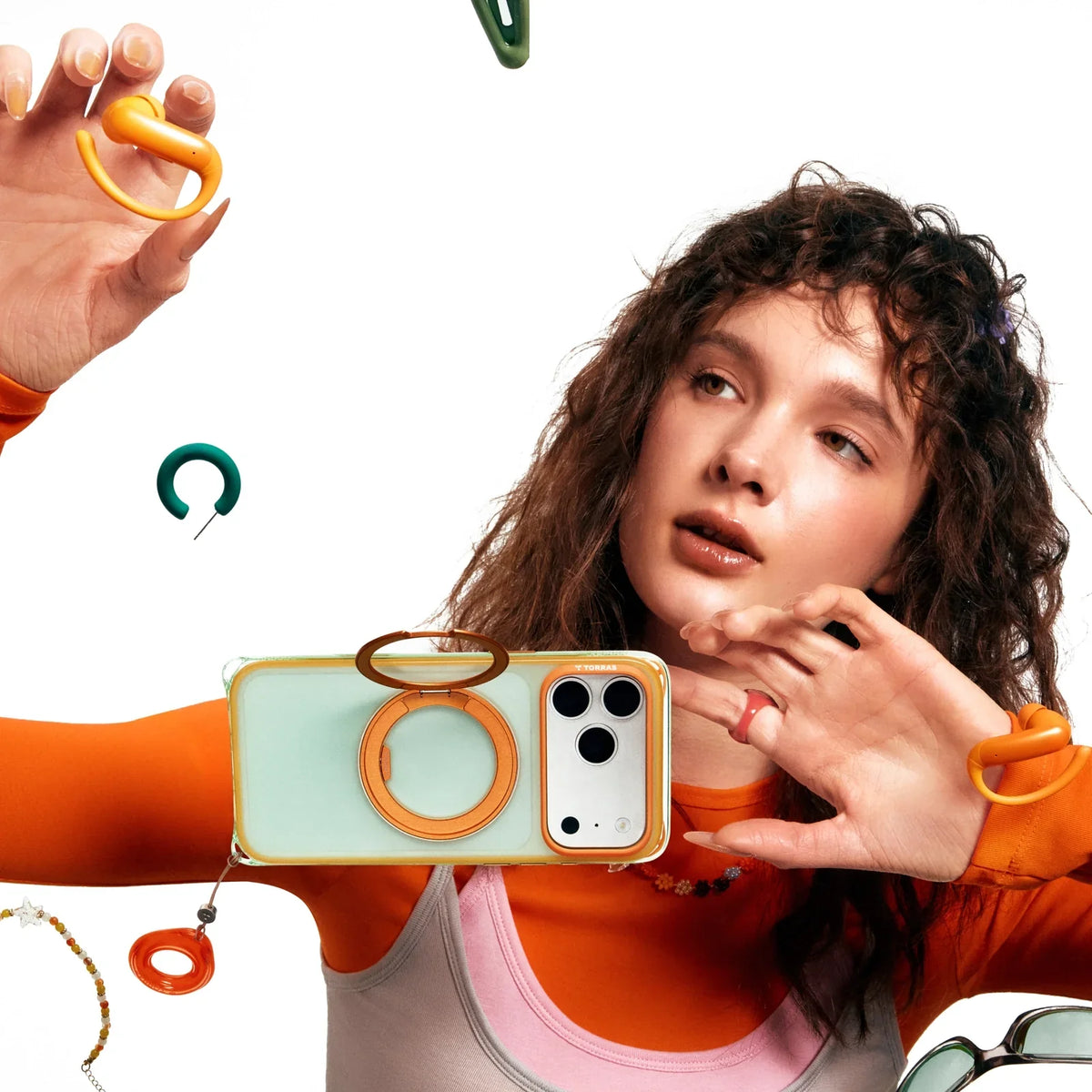 TORRAS Ostand O3 Air Bios magnetic iPhone 17 Pro case with orange ring stand