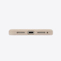 TORRAS Ostand Q3 beige silicone case for iPhone 17 Pro: bottom port and speaker grilles.