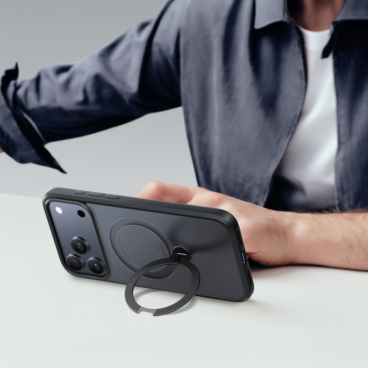 Ostand Q3 Spin magnetic case for iPhone 17, featuring a 360° rotatable ring stand.