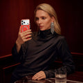 TORRAS Ostand Q3 Vegskin Red Edition iPhone 17 Series case with magnetic stand.