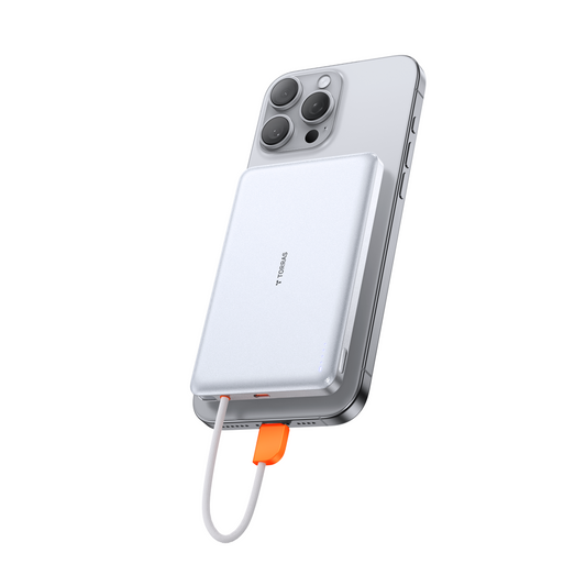TORRAS PebbleLink 10k mAh power bank attached to a silver smartphone, charging via USB-C.