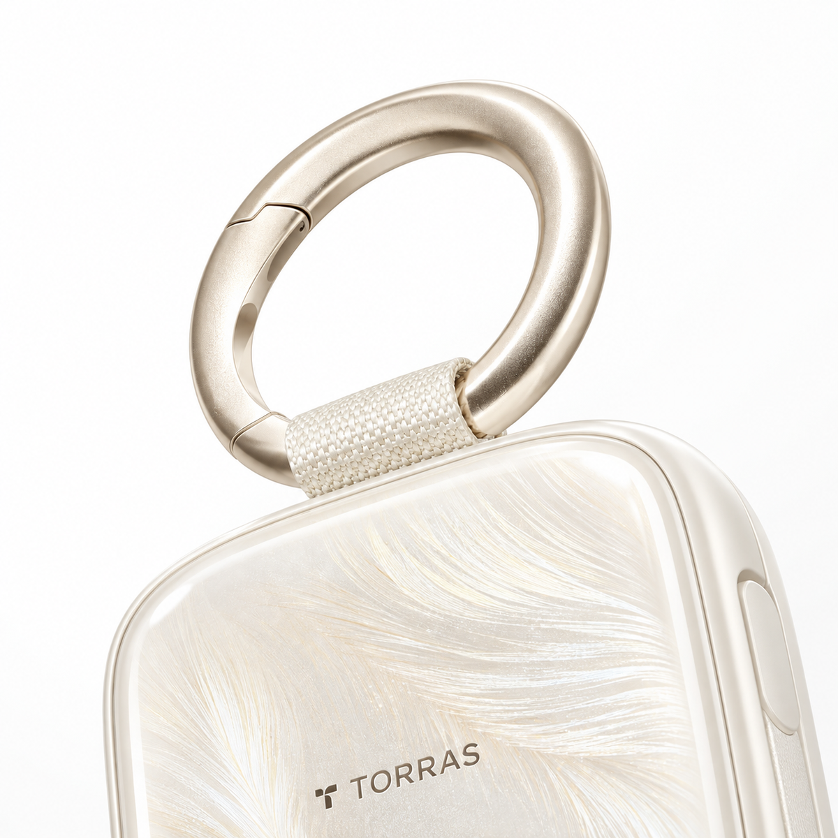PearlGo Pro close-up of light-gold ring, woven tab and pearl feather finish