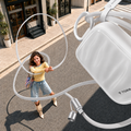 PearlGo retractable cable in a street scene with a USB-C lanyard connector
